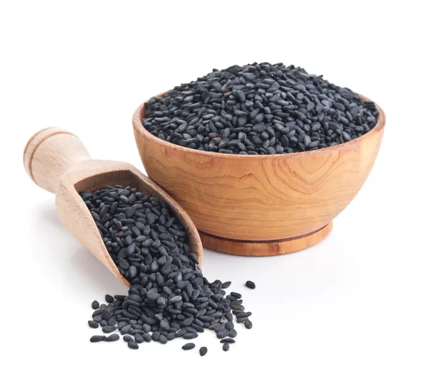 Black sesame seeds isolated on white — Stock Photo, Image
