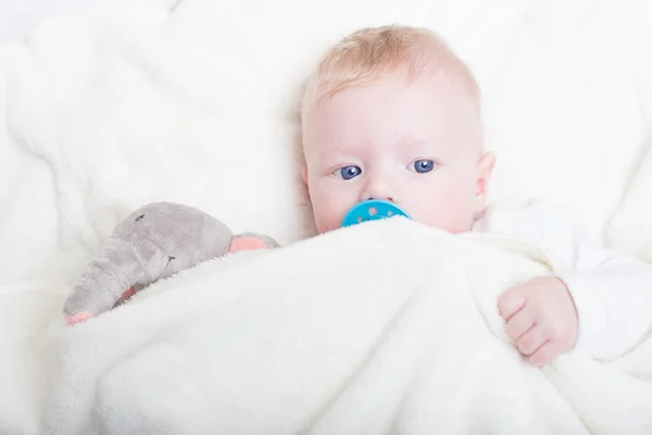 Baby with plush toy. — Stock Photo, Image