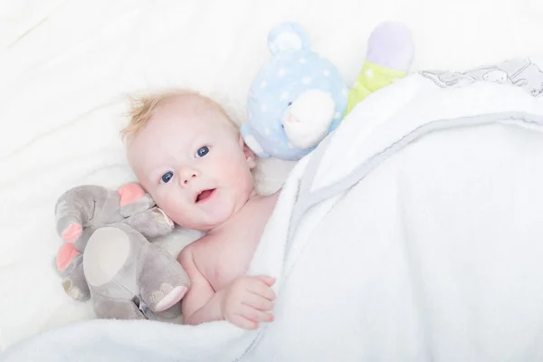 Baby with plush toy. — Stock Photo, Image