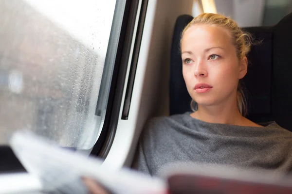 Lady traveling by train. — Stock Photo, Image