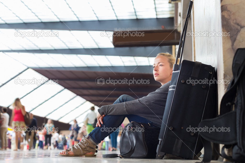 Female traveler waiting for departure.