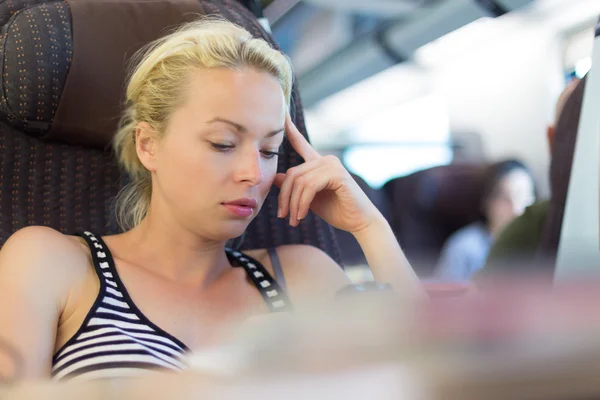 Lady traveling by train. — Stock Photo, Image