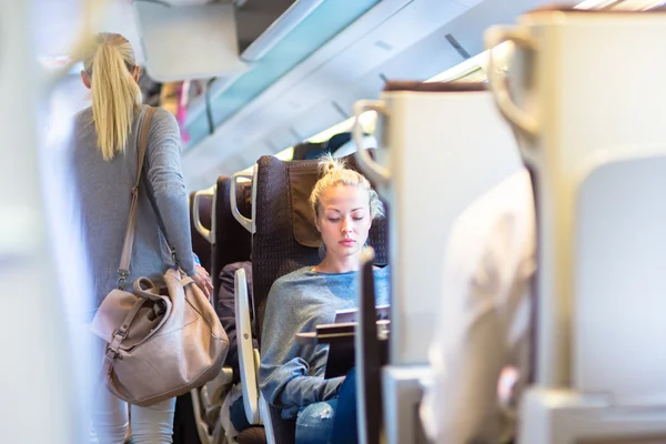 Lady traveling by train. — Stock Photo, Image