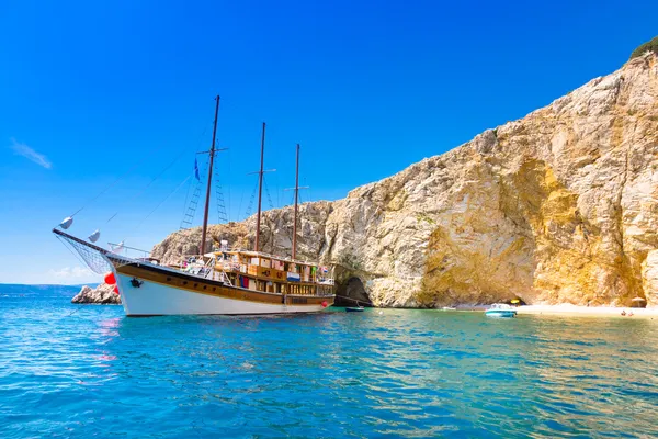 Vintage sailing boat in bay.