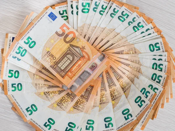 Tumpukan 50 euro uang kertas, latar belakang konsep bisnis — Stok Foto