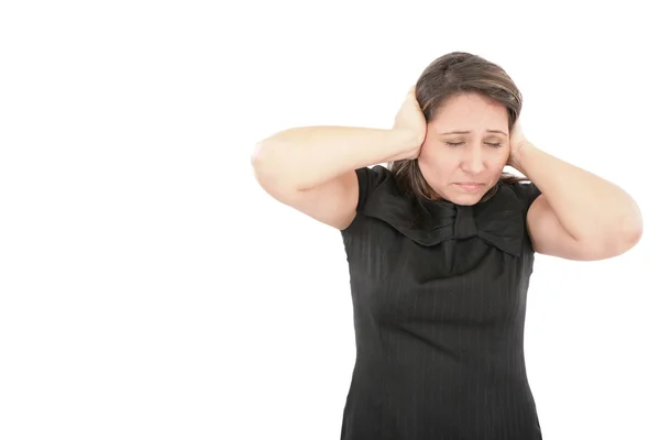 Benadrukt dat de jonge vrouw die betrekking hebben op zijn oren, grimassen en gebaren — Stockfoto