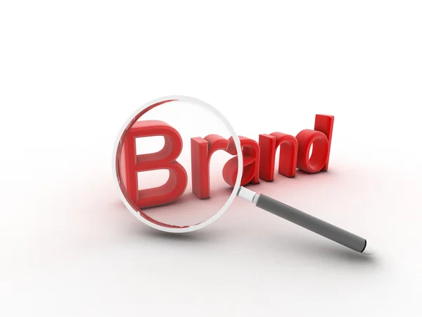 The word Brand under a magnifying glass illustrating marketing a — Stock Photo, Image