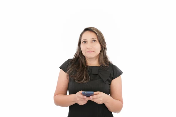 Close-up of a brunette texting against white background — Stock Photo, Image