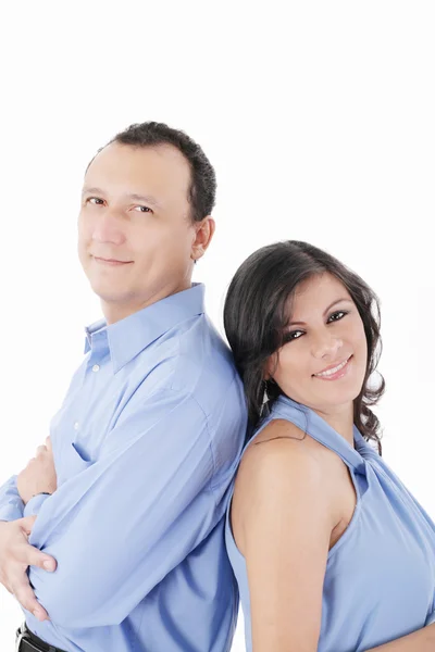 Casal latino sorrindo isolado em um fundo branco — Fotografia de Stock