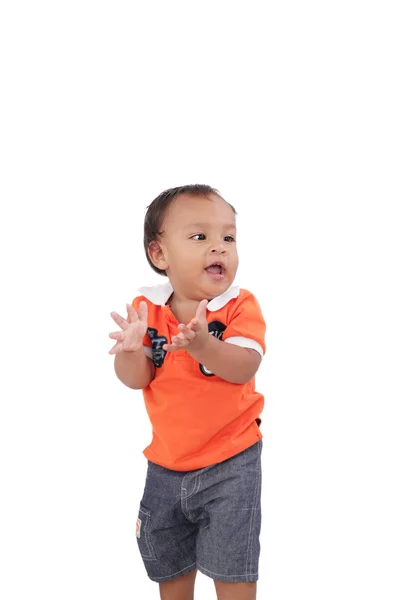 Happy one year old baby boy walking on white background — Stock Photo, Image