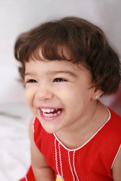 Beautiful little girl isolated on a white background — Stock Photo, Image