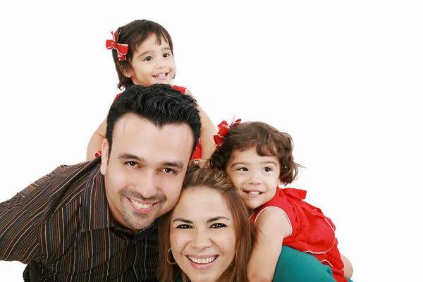 Beautiful family enjoying, mom and dad playing with their daught Royalty Free Stock Photos