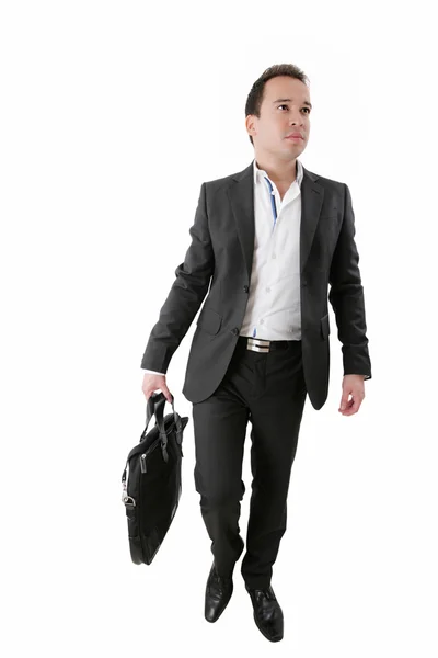 Portrait of a business man carrying a suitcase on white backgrou — Stock Photo, Image