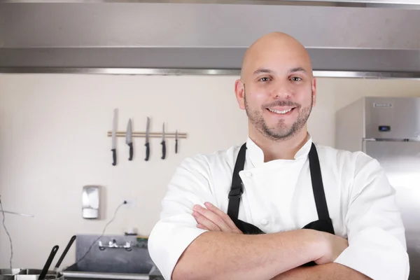 Portrait of a professional chef smiling — Stock Photo, Image