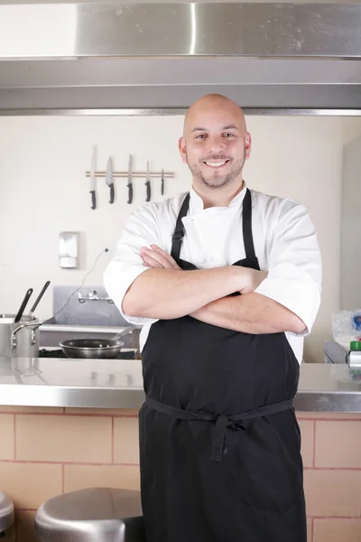 Portrait of young male chef in commercial kitchen — Stock Photo, Image