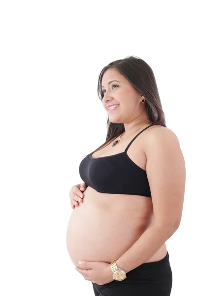 Mujer embarazada feliz mirando a un copyspace aislado —  Fotos de Stock