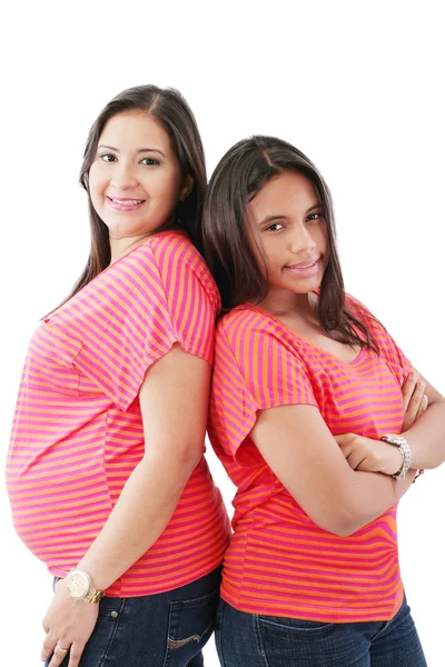 Beautiful hispanic pregnant woman with her daughter — Stock Photo, Image
