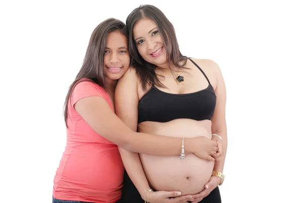 Beautiful pregnant woman and her daughter Stock Photo