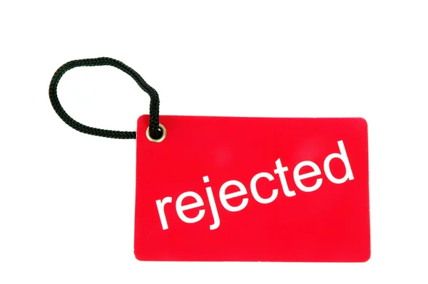 Red paper tag labeled with rejected words — Stock Photo, Image