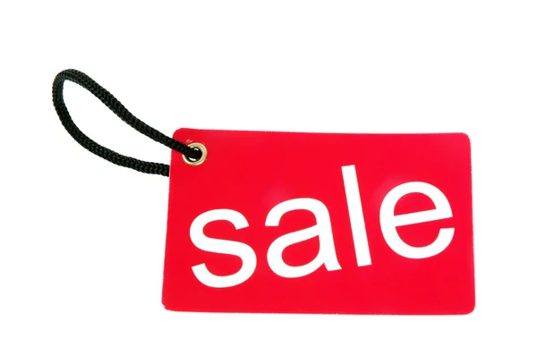 Red paper tag labeled with sale words — Stock Photo, Image