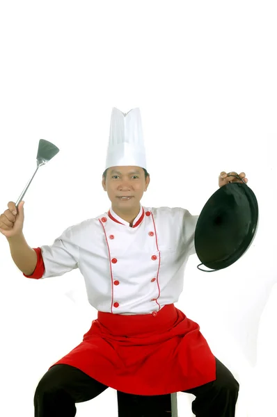 Chef memegang peralatan memasak — Stok Foto