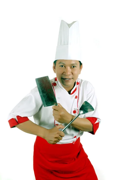 Σεφ κρατώντας μαγειρικά σκεύη και μαχαίρι κουζίνας — Φωτογραφία Αρχείου