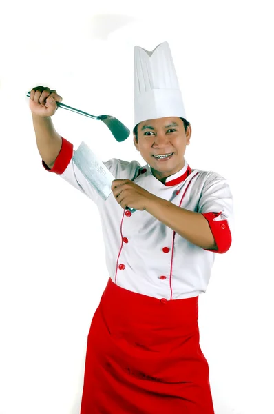 Chef holding cooking utensils and kitchen knife — Stock Photo, Image