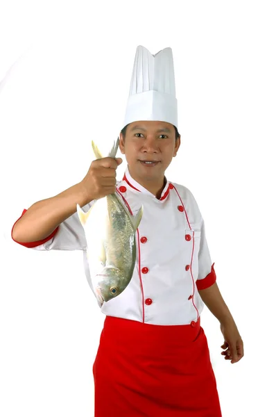 Chef tenant un gros poisson cru — Photo