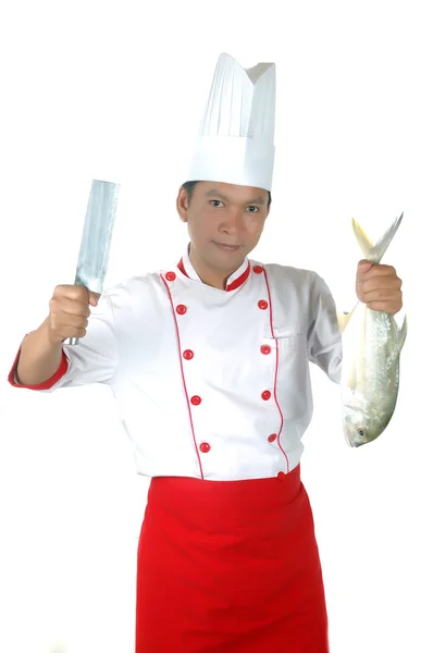 Chef holding a big raw fish and kitchen knife — Stock Photo, Image