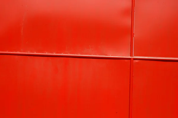 Текстура красных железных ворот — стоковое фото