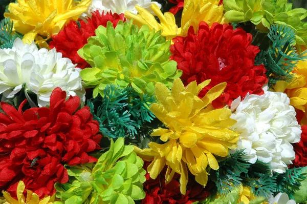 Composition of colorful the artificial flower decorations for background — Stock Photo, Image