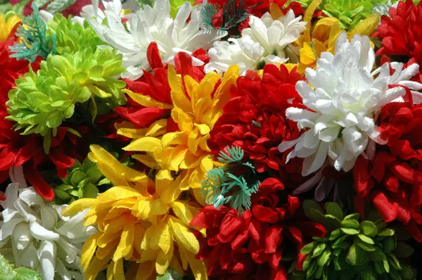 Composition of colorful the artificial flower decorations for background — Stock Photo, Image