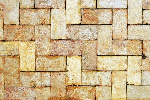 Gyldne mursten væg baggrund - Stock-foto