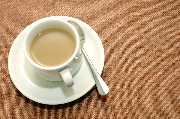 Una taza de café con crema — Foto de Stock