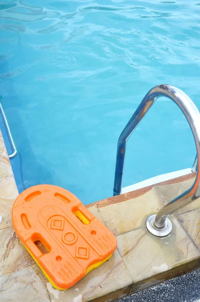 Stainless ladder in the pool — Stock Photo, Image