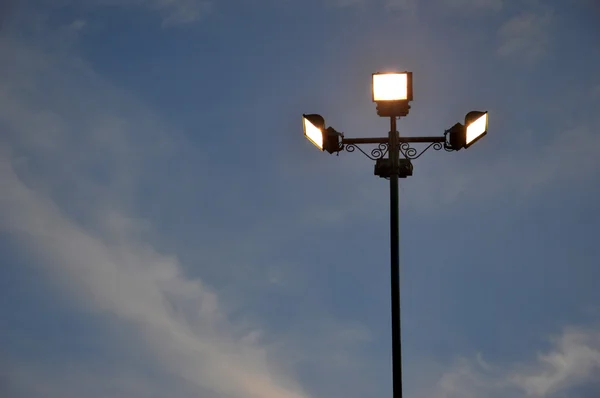 Four park light poles — Stock Photo, Image