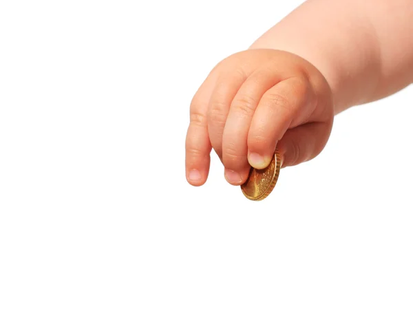 Baby's hand en munt. — Stockfoto