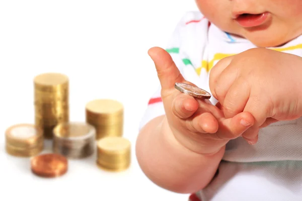 Baby und Münze. — Stockfoto