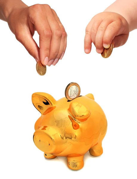 Baby's and mothers' hands with coins. — Stock Photo, Image