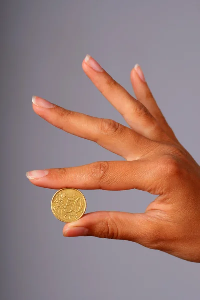 Münze in der Hand. — Stockfoto