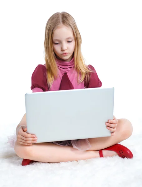 Young girl using notebook computer — Stock Photo, Image