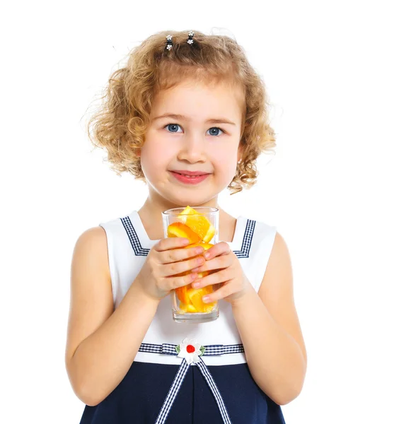 Portrait of little girl drinking orange juice — Stock Photo, Image