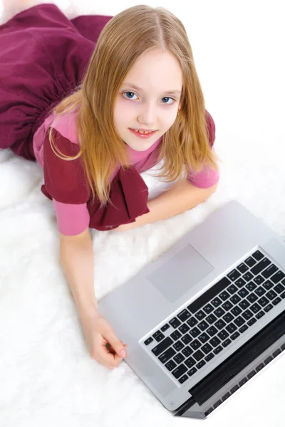Young girl using notebook computer Stock Photo by ©mac_sim 14609243