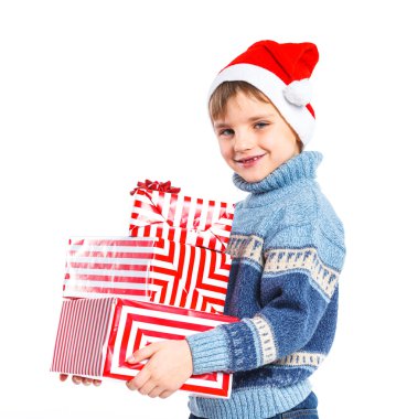 Noel Baba'nın şapkalı hediye kutusu ile küçük çocuk