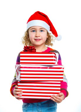 Hediye kutusu ile Noel Baba'nın şapkalı küçük kız