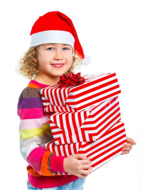 Hediye kutusu ile Noel Baba'nın şapkalı küçük kız