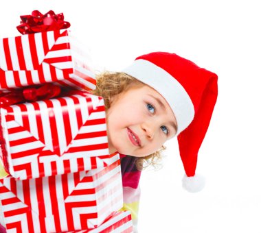 Hediye kutusu ile Noel Baba'nın şapkalı küçük kız