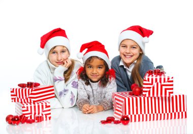 Mutlu Noel Baba'nın şapka hediye kutusu ile çocuklarda