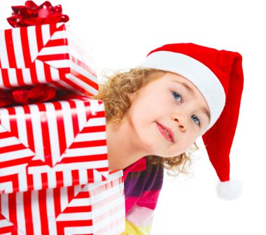 Hediye kutusu ile Noel Baba'nın şapkalı küçük kız