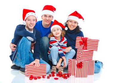 Noel Baba'nın şapka hediye kutusu ile ailede